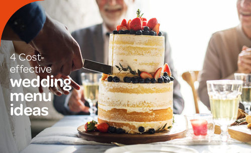 Cutting wedding cake - naked cake with berries