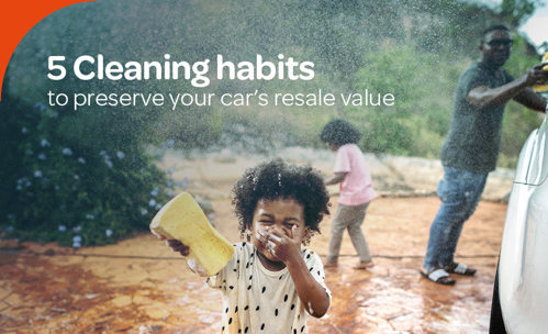 Family cleaning exterior of car together