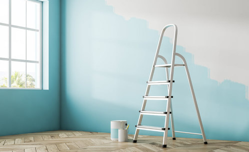Step ladder in room that's being painted blue