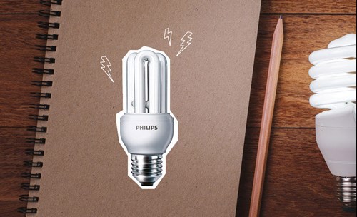 Picture of light bulb on notebook